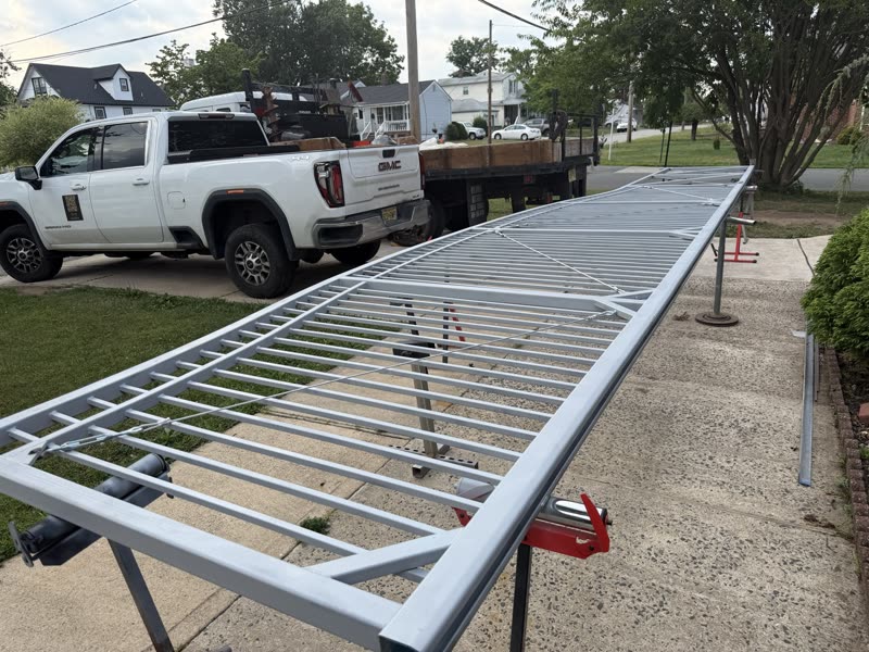 Custom aluminum gate frame being built on site